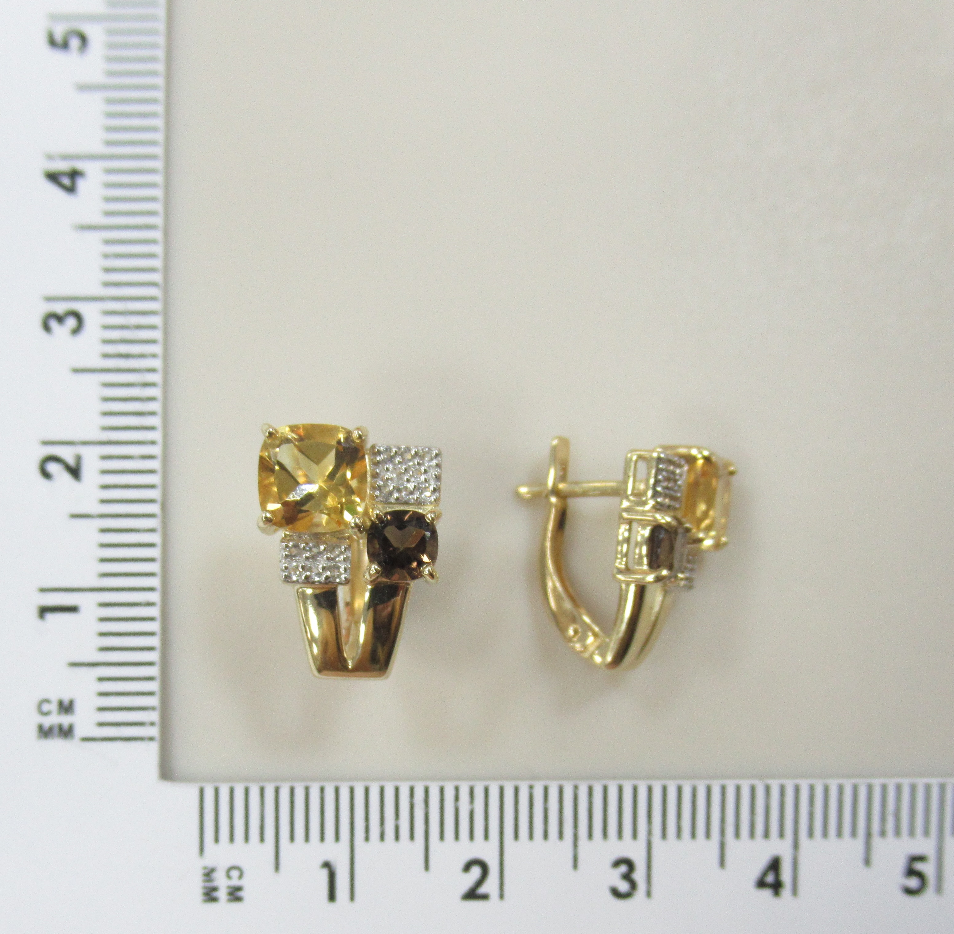 Серьги из желтого золота с цитринами и раухтопазами